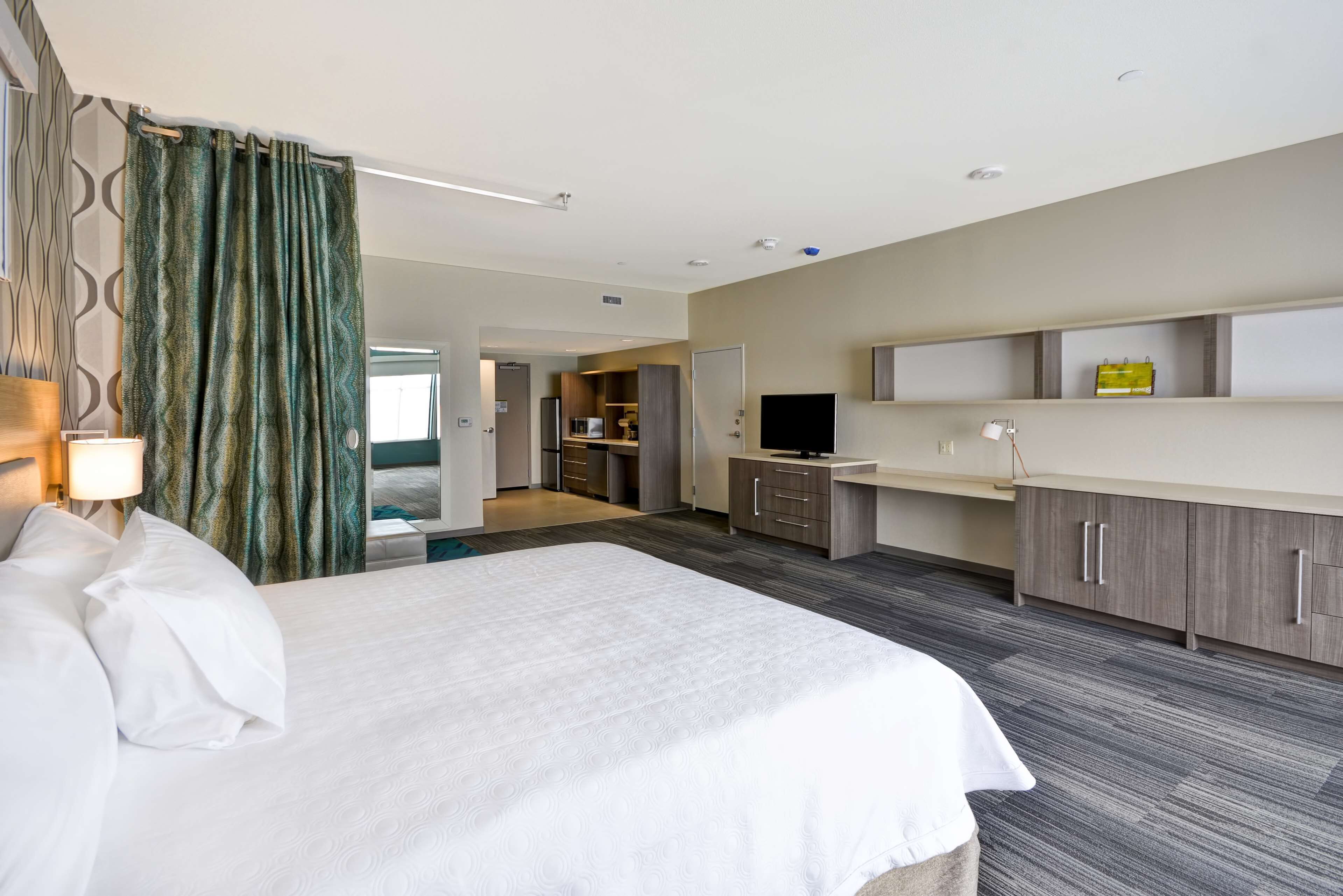 desk, blackout curtains, free cots/infant beds, free wifi