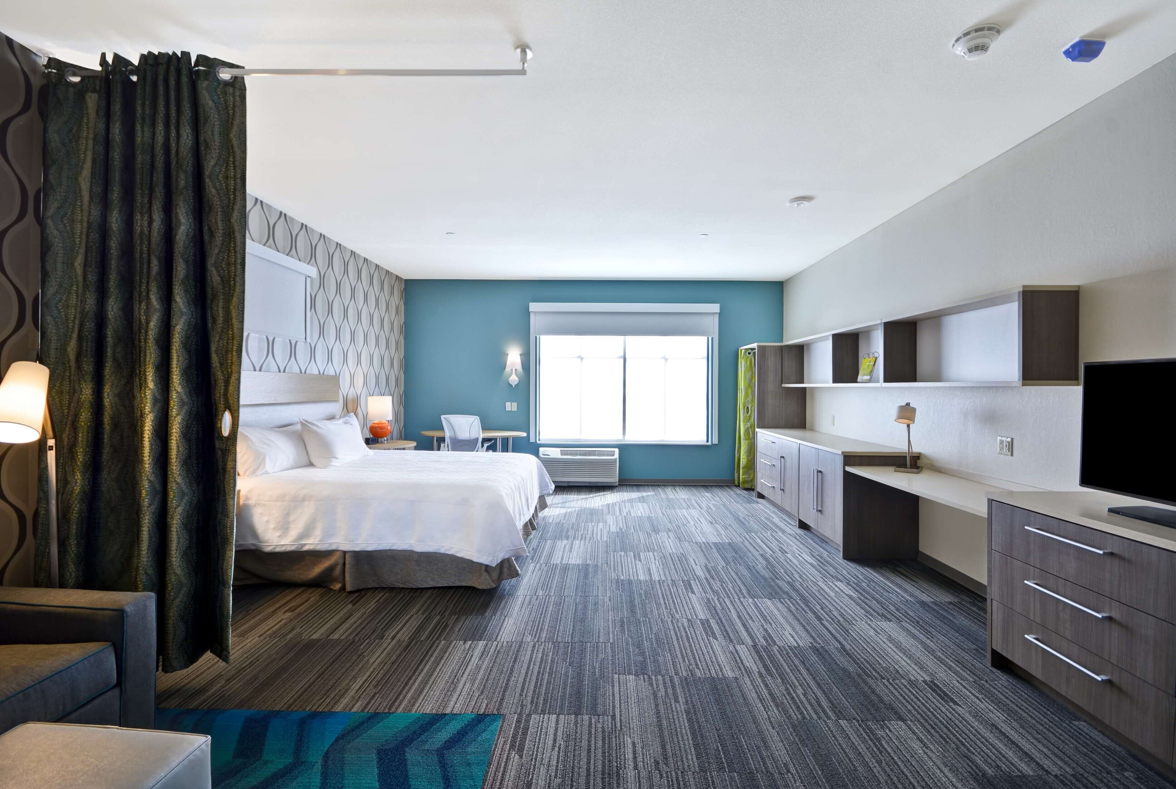 desk, blackout curtains, free cots/infant beds, free wifi