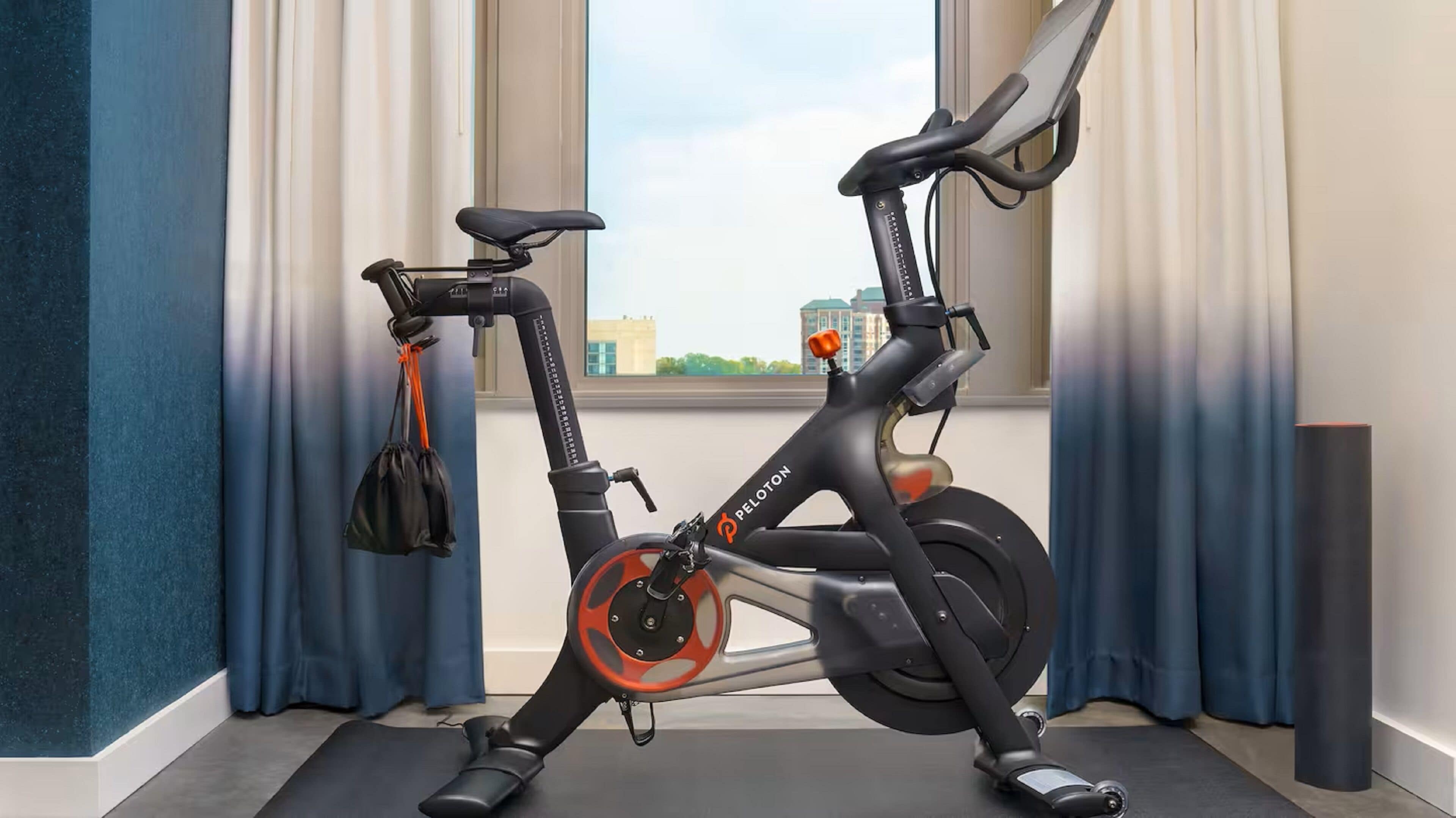 room, 1 king bed (peloton wellness room) | premium bedding, in-room safe, desk, laptop workspace