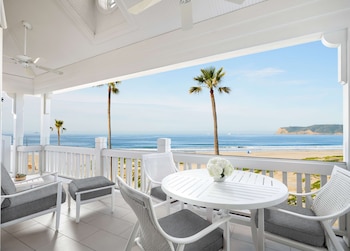 Hotel room view looking out at Beach Village at The Del, LXR Hotels & Resorts