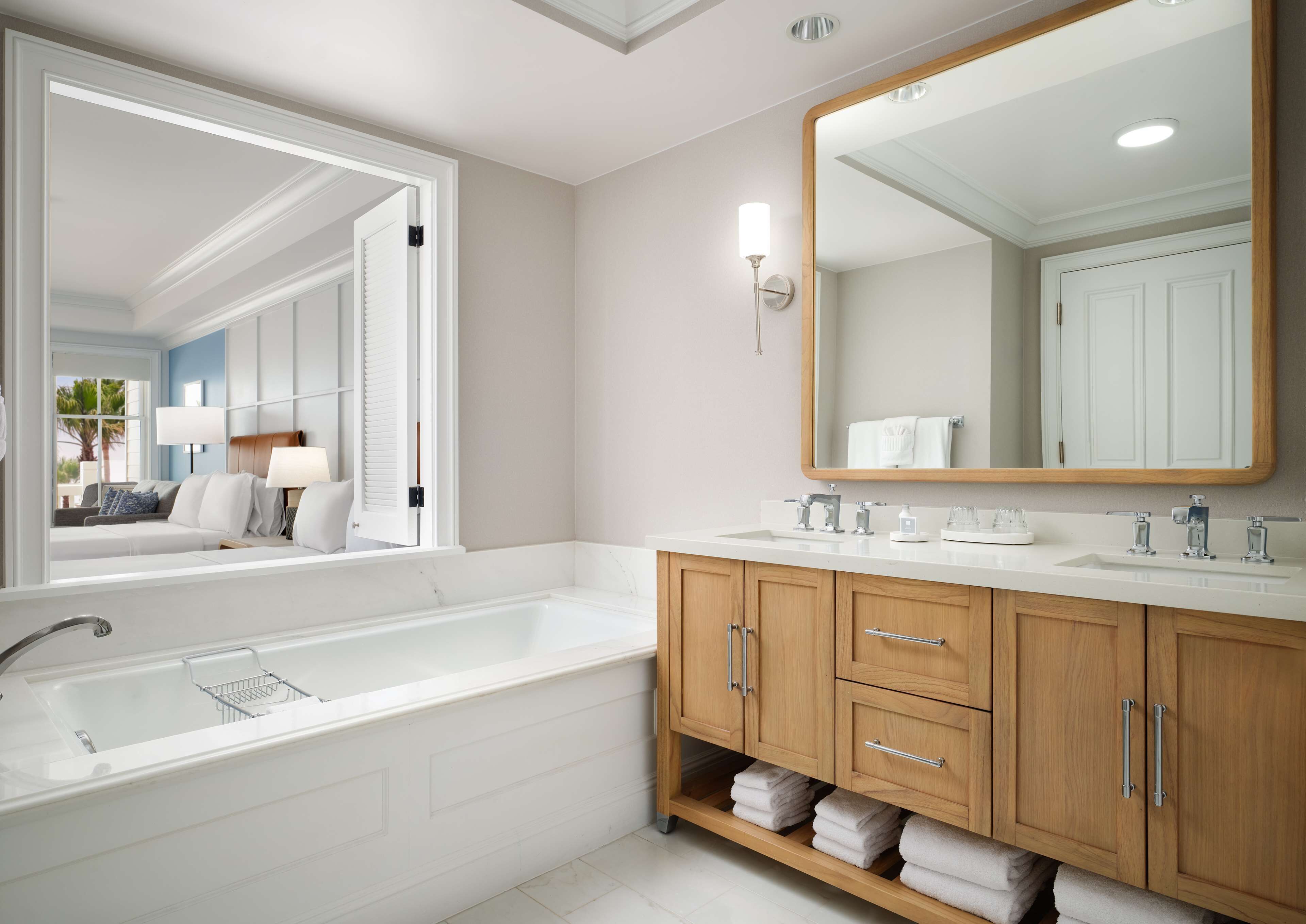 separate bathtub and shower, designer toiletries, hair dryer, bathrobes