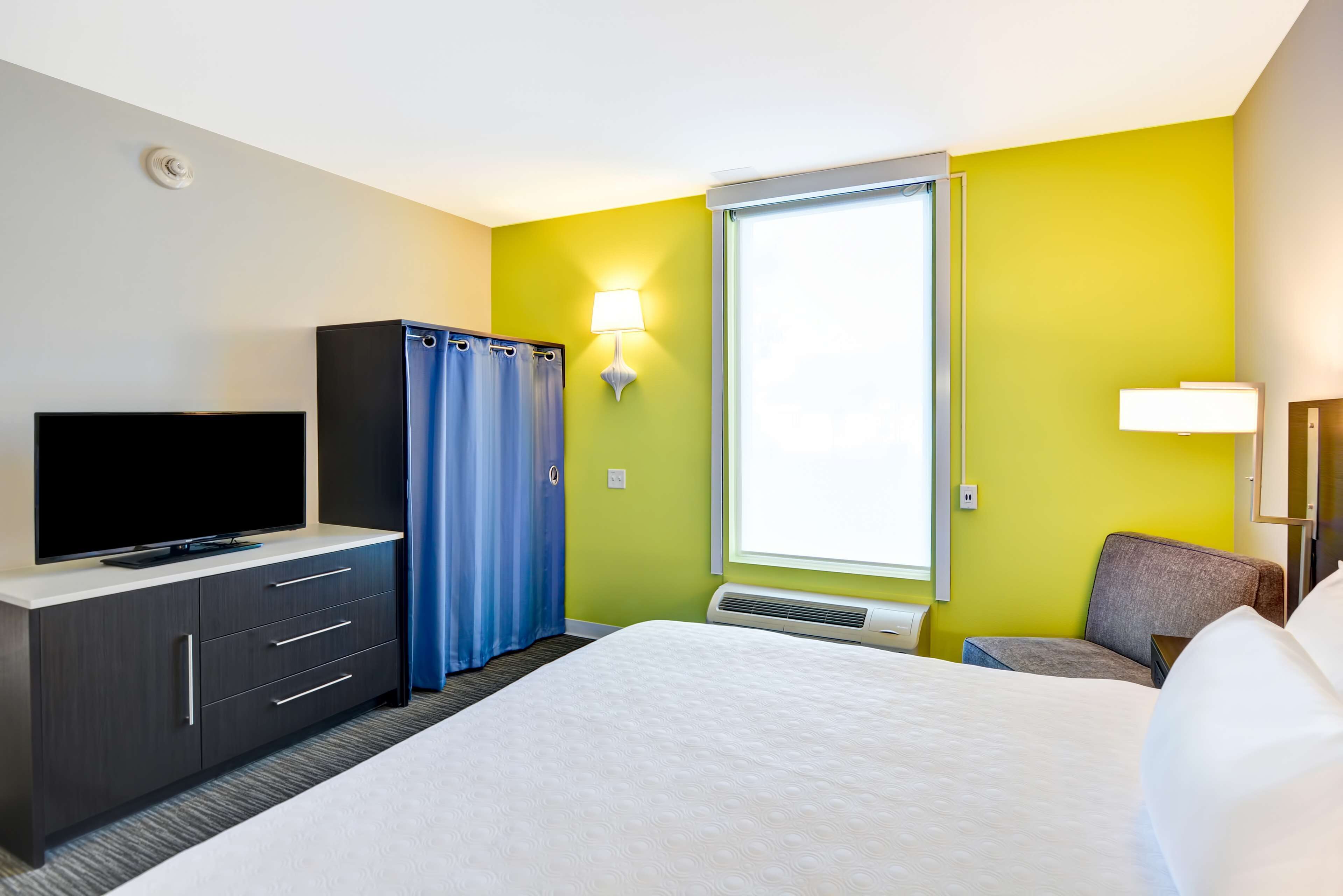 premium bedding, desk, blackout curtains, soundproofing