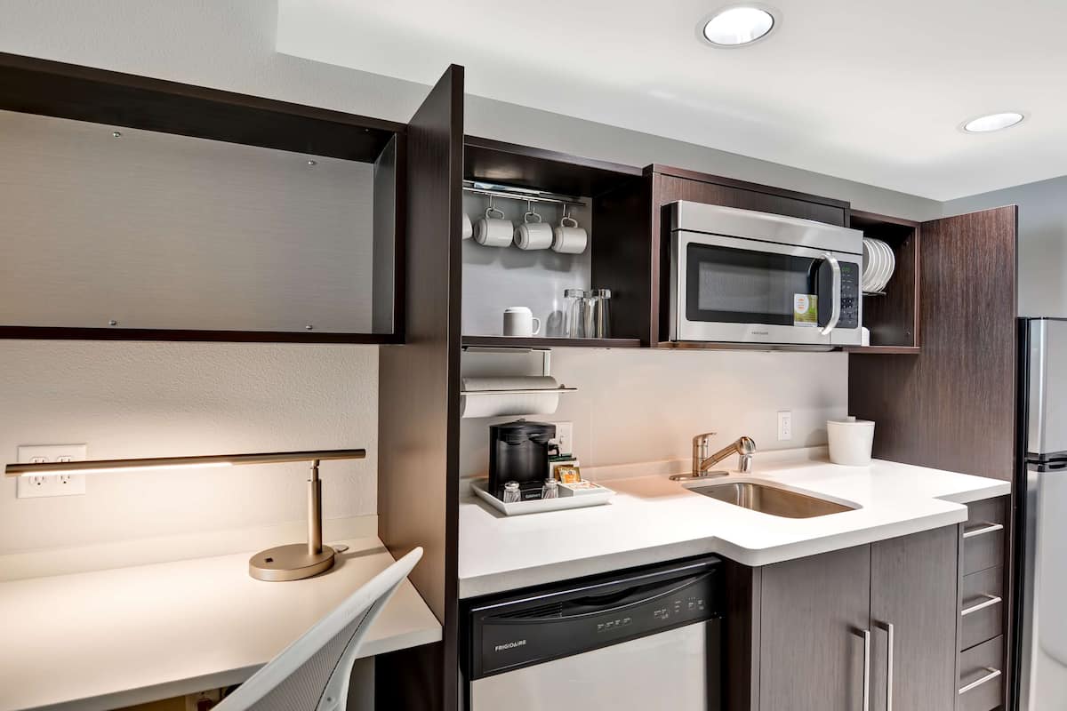 Premium bedding, desk, blackout drapes, soundproofing