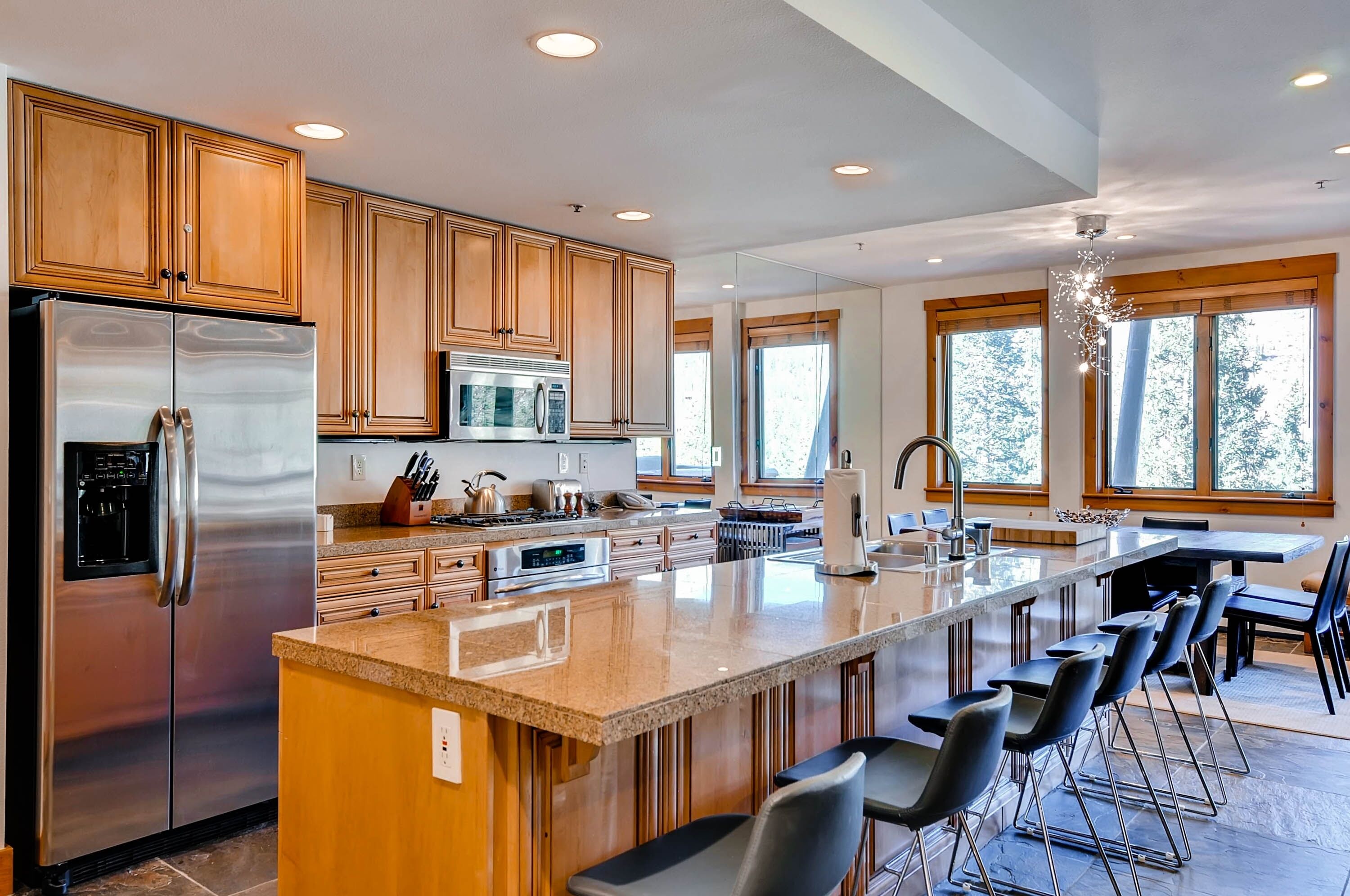 Condo, 4 Bedrooms | Private kitchen | Coffee/tea maker, full-sized fridge, microwave, oven
