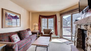 Condo, 1 Bedroom | Living area | Flat-screen TV, DVD player