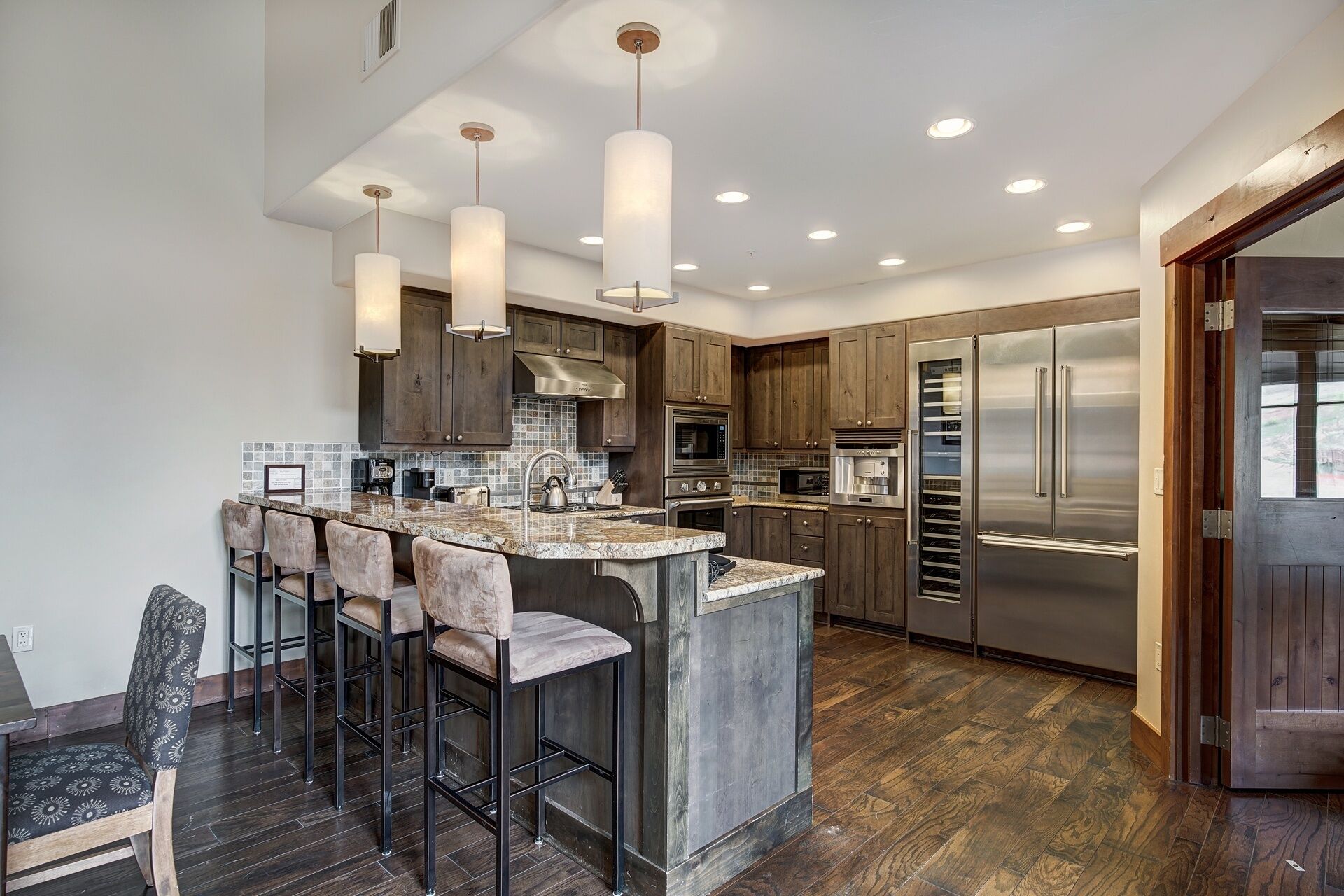 Condo, 4 Bedrooms | Private kitchen | Full-sized fridge, microwave, oven, stovetop