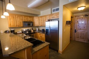 Condo, 2 Bedrooms | Private kitchen | Full-size fridge, microwave, oven, stovetop