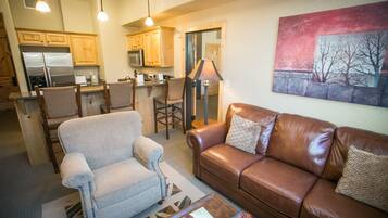Condo, 1 Bedroom | Living room | Flat-screen TV, fireplace, DVD player