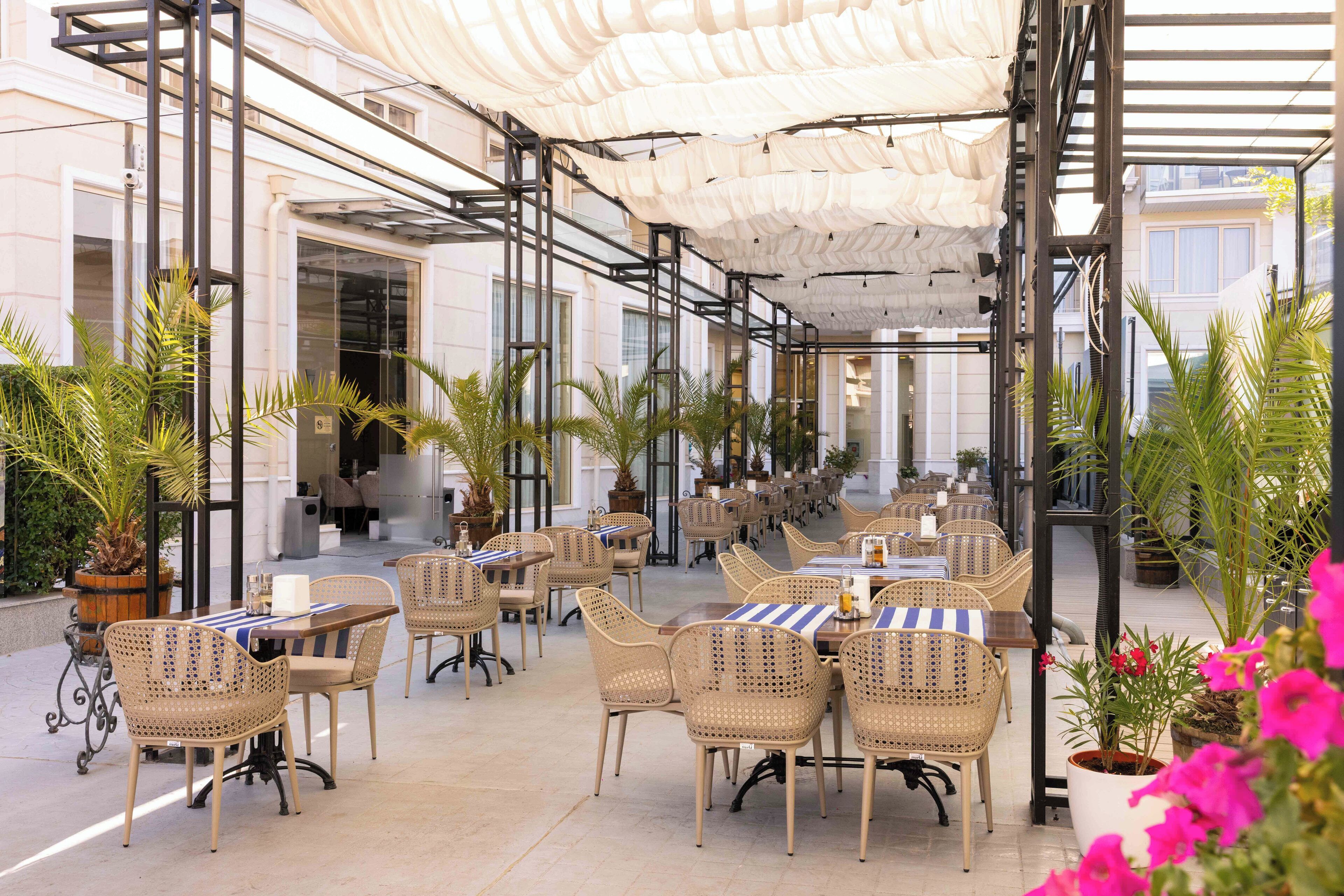 Breakfast, lunch, dinner served; local and international cuisine 