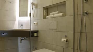 Shower, free toiletries, hair dryer, towels