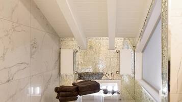 Shower, free toiletries, hair dryer, towels