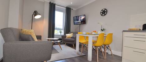 Flat-screen TV, iPad, DVD player
