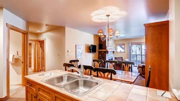 Condo, 2 Bedrooms | Private kitchen | Full-size fridge, microwave, oven, stovetop