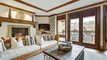 Condo, 4 Bedrooms | Living area | Flat-screen TV, fireplace, DVD player
