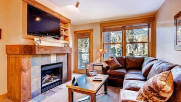 Condo, 2 Bedrooms | Living area | Flat-screen TV, fireplace, video game console, DVD player