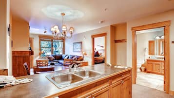 Condo, 2 Bedrooms | Private kitchen | Full-size fridge, microwave, oven, stovetop