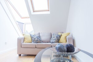 Deluxe Apartment, 1 Bedroom, Kitchen | Living area | Flat-screen TV