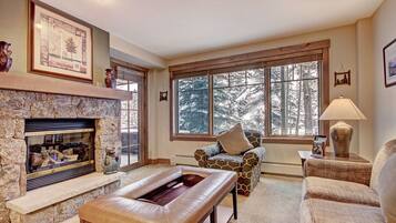 Condo, 1 Bedroom | Living area | Flat-screen TV, fireplace, DVD player