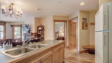 Condo, 2 Bedrooms | Private kitchen | Full-size fridge, microwave, oven, stovetop