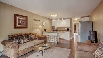 Condo, 1 Bedroom | Living room | TV, fireplace