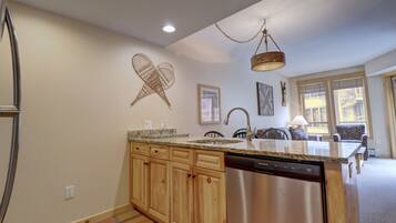 Condo, 1 Bedroom | Private kitchen | Microwave, dishwasher, cookware/dishes/utensils, paper towels