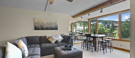 Condo, 2 Bedrooms | Living area | Flat-screen TV, DVD player