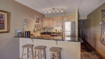 Condo, 1 Bedroom | Private kitchen | Full-sized fridge, microwave, oven, stovetop
