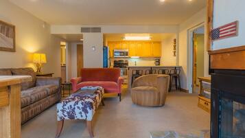 Condo, 2 Bedrooms | Living room | 46-inch flat-screen TV with cable channels, TV, DVD player