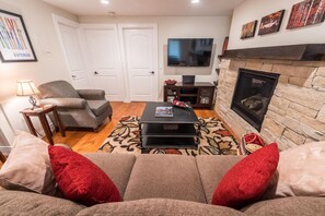 Condo, 2 Bedrooms | Living area | Flat-screen TV, video-game console, DVD player