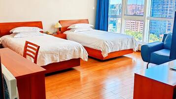 Standard Room, City View | Down comforters, minibar, desk, laptop workspace