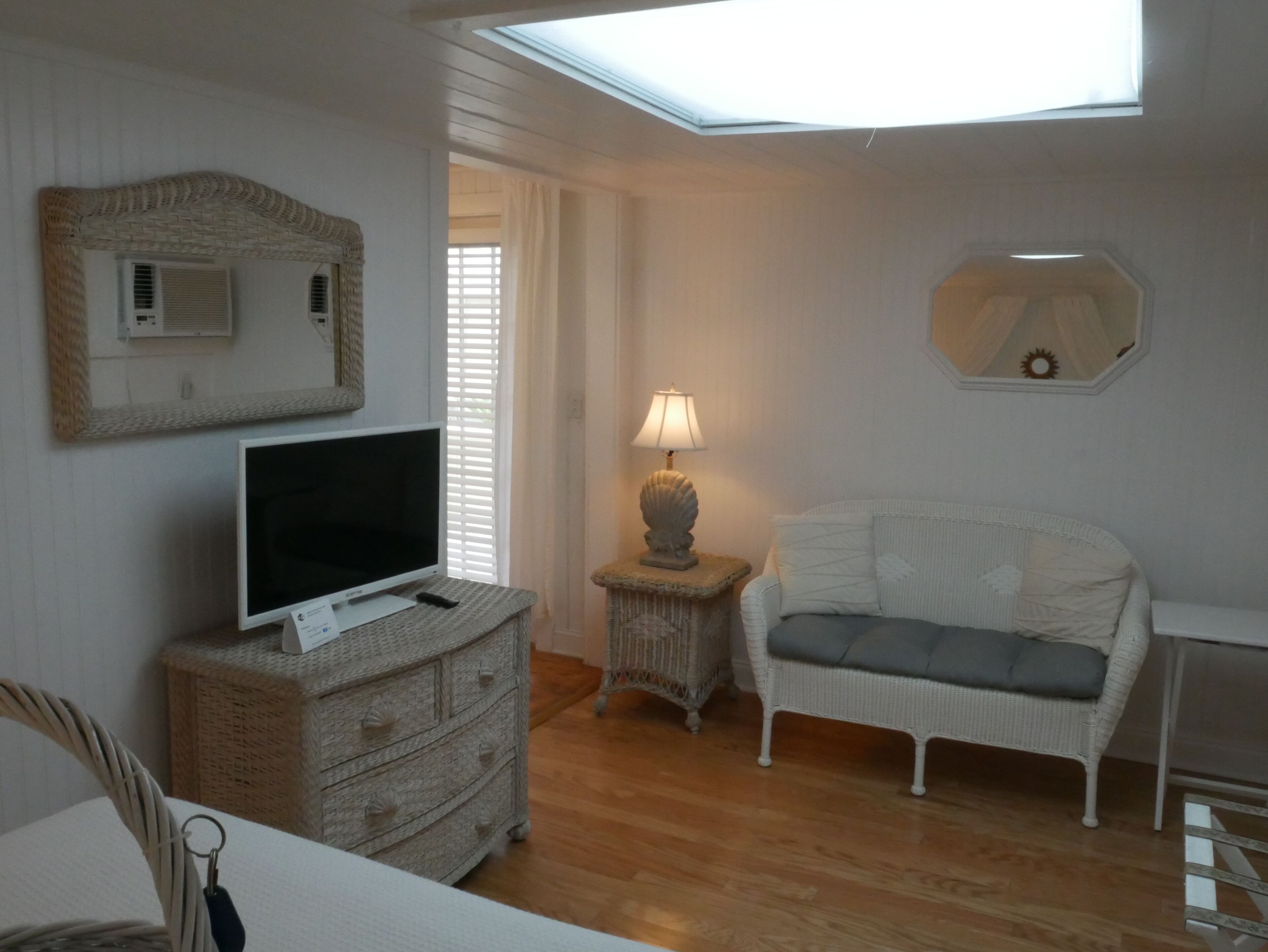 romantic studio suite, private bathroom (103 coconut) | in-room safe, iron/ironing board, free wifi, bed sheets