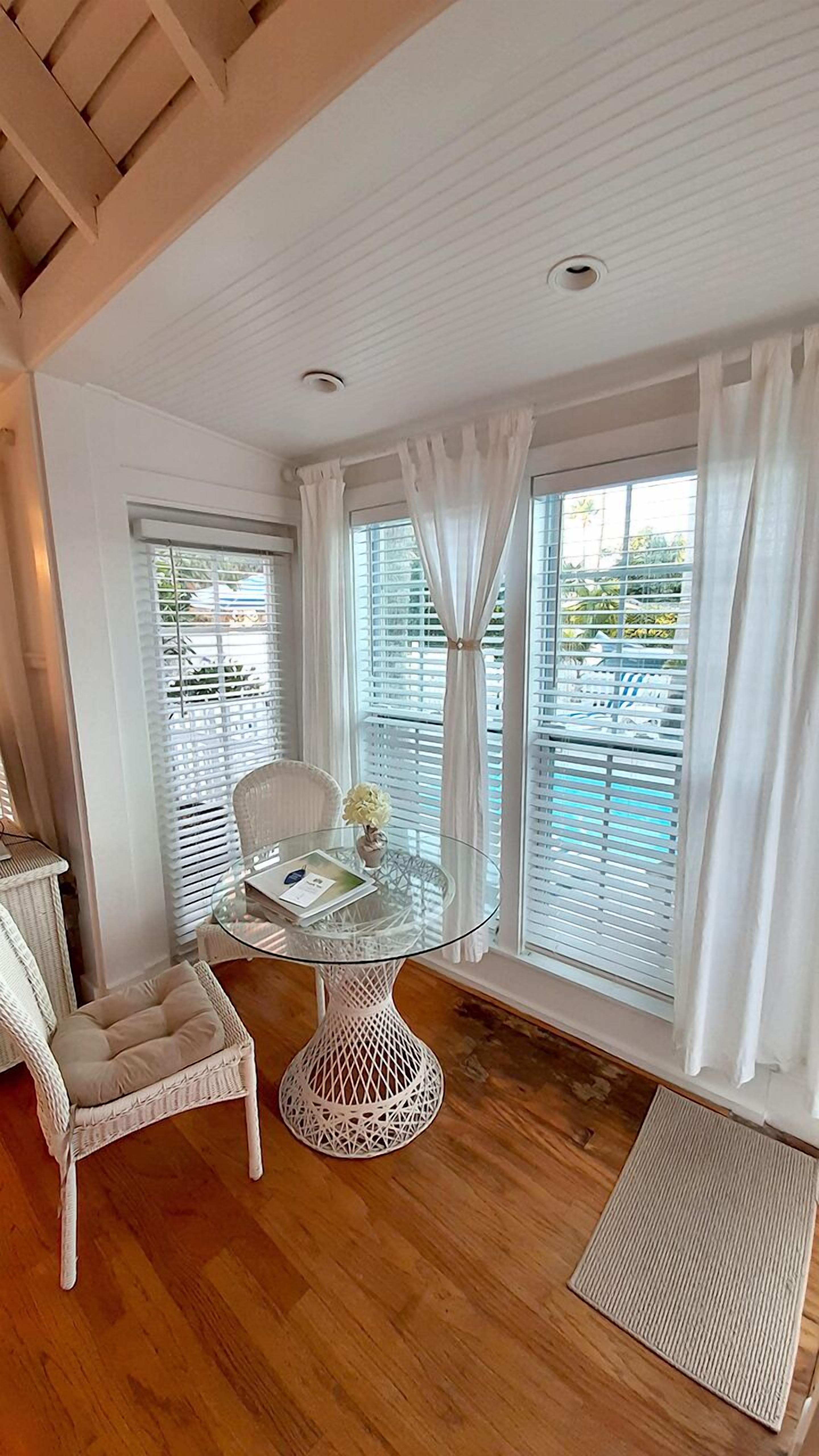 romantic studio suite, private bathroom (111 pineapple) | in-room safe, iron/ironing board, free wifi, bed sheets