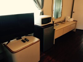 Quarto superior, 1 cama King | Individualmente decorados, individualmente mobiliados, Wi-Fi de cortesia