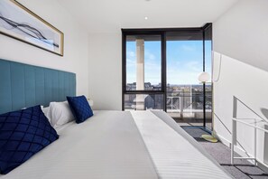 Three Bedroom Two Bathroom Apartment | Desk, laptop workspace, blackout curtains, soundproofing - The Eminence Apartments by CLLIX (Carlton)
