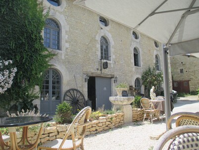 Step back in time,beautiful restored village property in the centre of Verteuil.