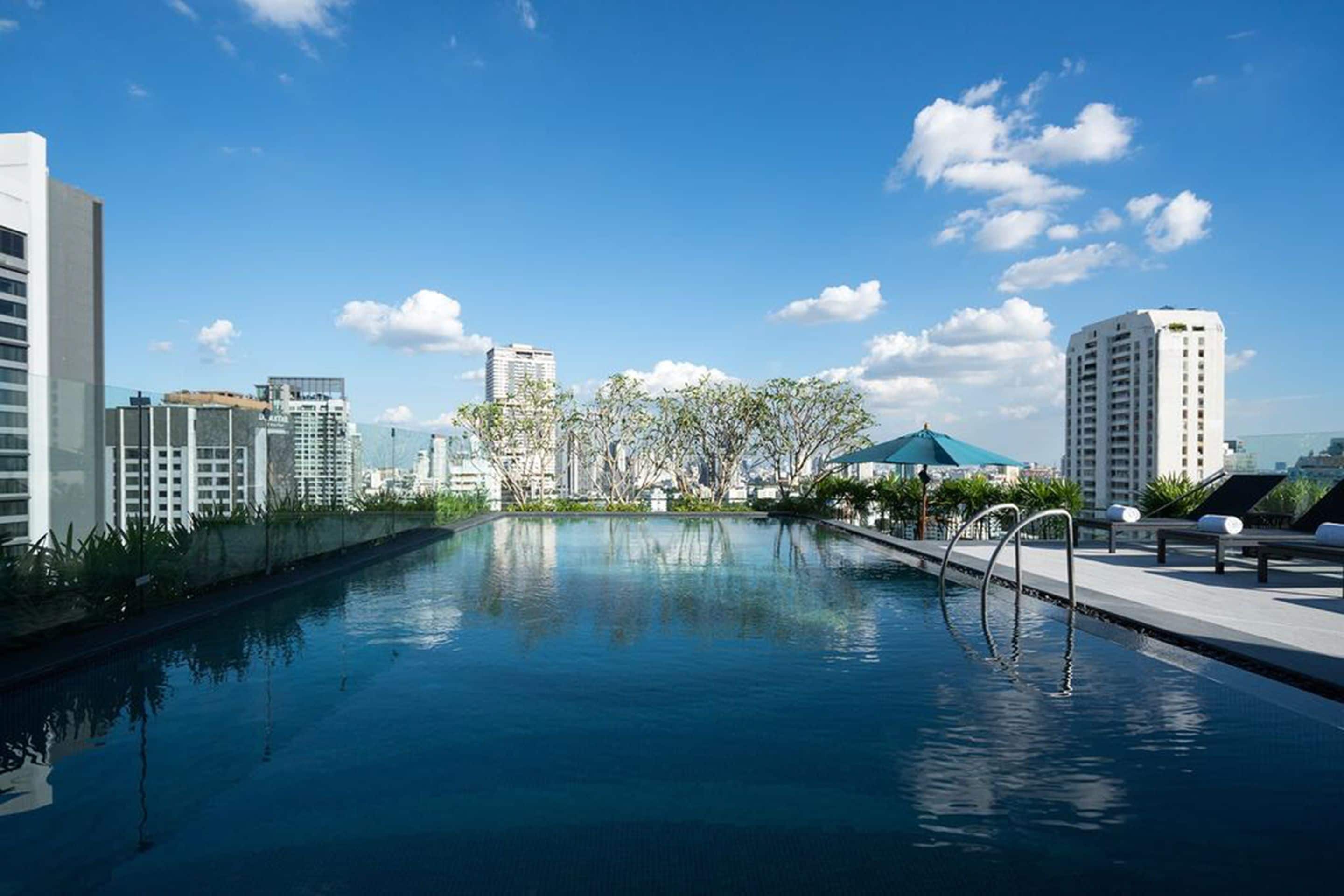 outdoor pool, open 6 am to 9 pm, pool loungers