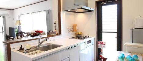Villa, 2 Bedrooms | Private kitchen | Full-size fridge, microwave, stovetop, dishwasher