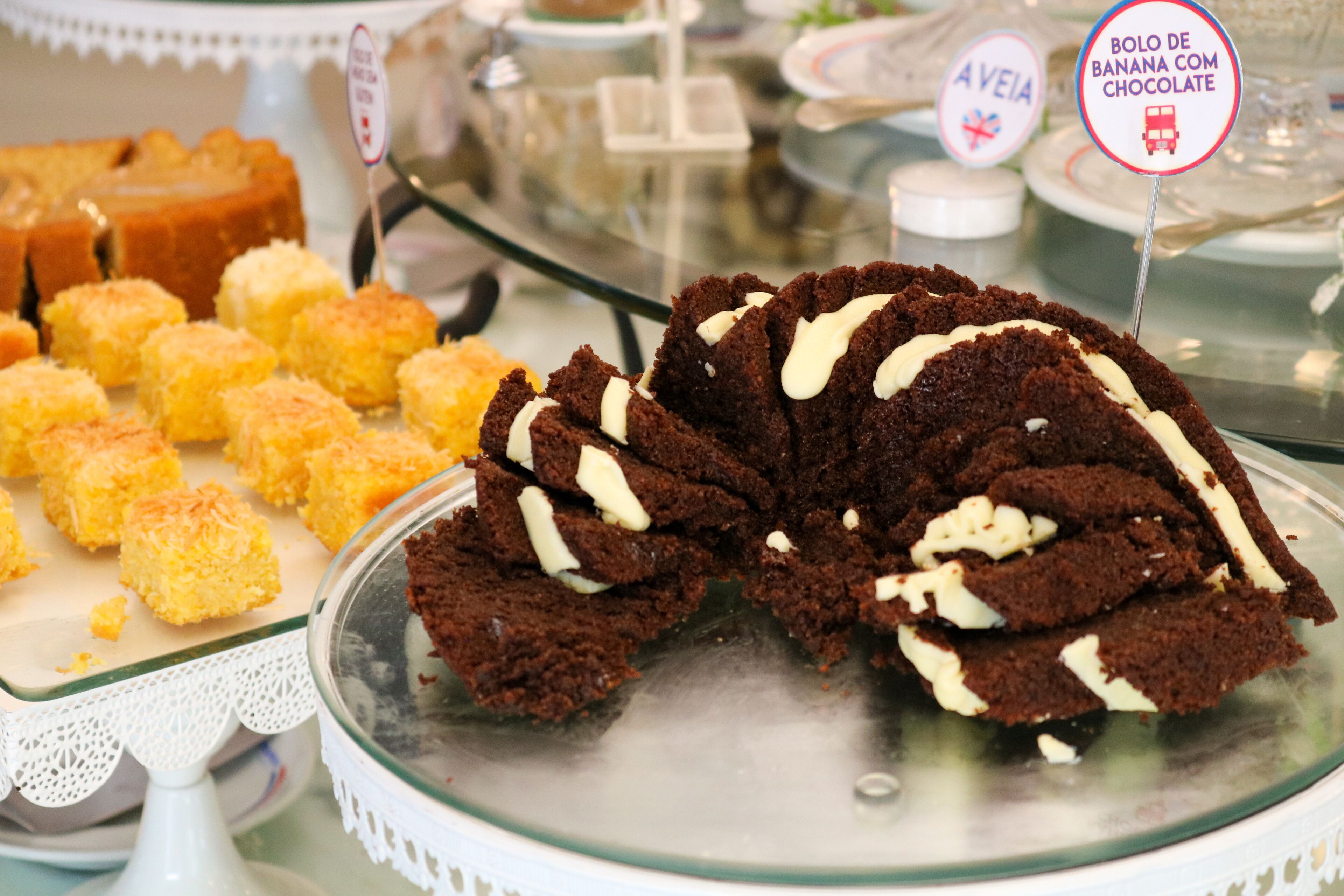 A dessert display with various cakes and pastries.
