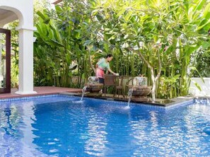 Indoor pool, outdoor pool, open 6 AM to 6 PM, pool umbrellas