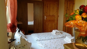 2 bedrooms, desk, iron/ironing board, travel crib