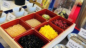 A food display with various ingredients in containers, including soybeans, pickled radish, and plum and hijiki. - Toyoko Inn Hikone Station Higashi (Hikone)