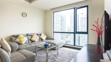 Apartment, 3 Schlafzimmer | Wohnbereich | 40-Zoll-Flachbildfernseher mit Kabelempfang, Fernseher