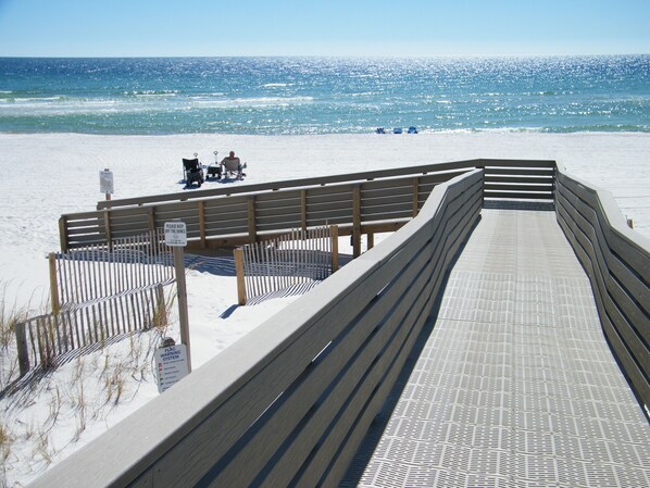 On the beach, sun-loungers
