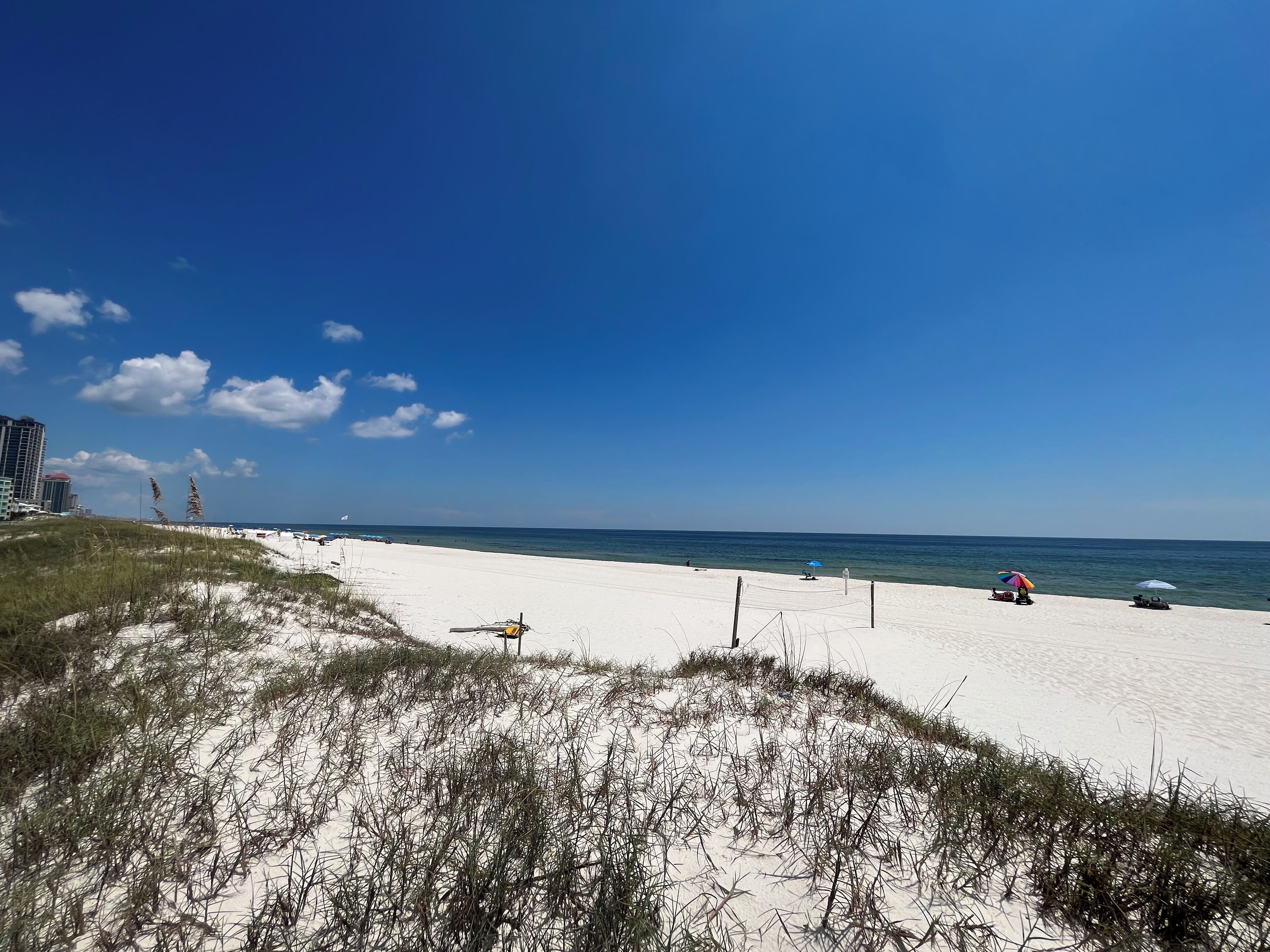 On the beach, sun-loungers