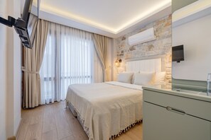 Standaard tweepersoonskamer | Lakens van Egyptisch katoen, luxe beddengoed, een minibar