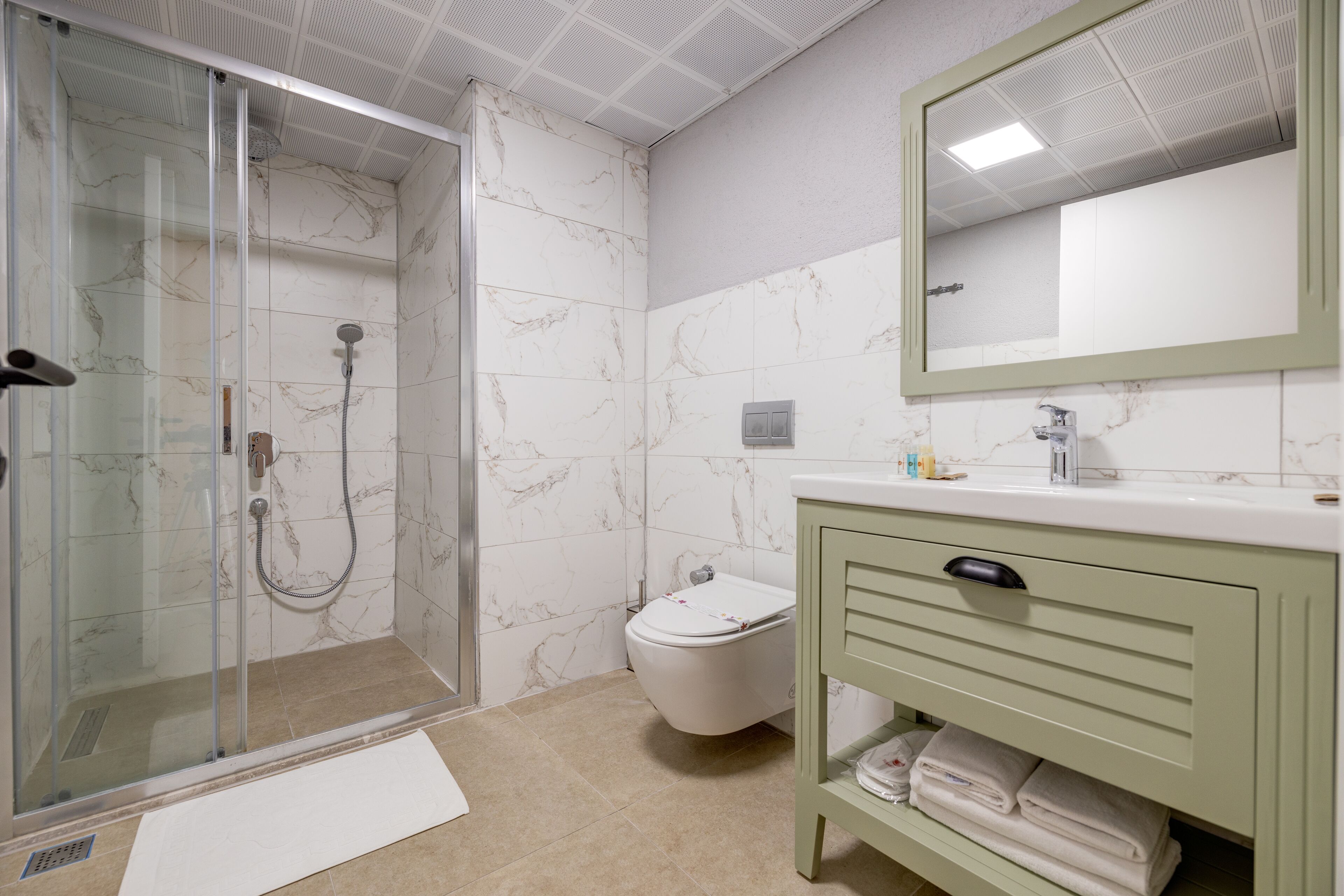 shower, free toiletries, hair dryer, slippers