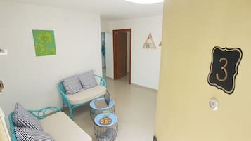 Comfort Apartment, 2 Bedrooms | Living room | Flat-screen TV
