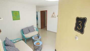 Comfort Apartment, 2 Bedrooms | Living room | Flat-screen TV