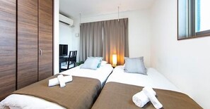 Business Studio, 1 Bedroom | 1 bedroom, iron/ironing board, free WiFi, bed sheets