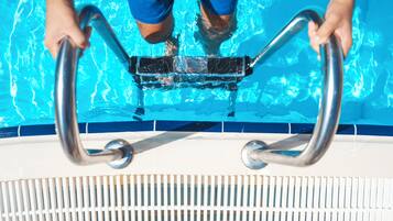 Outdoor pool, pool umbrellas, sun loungers